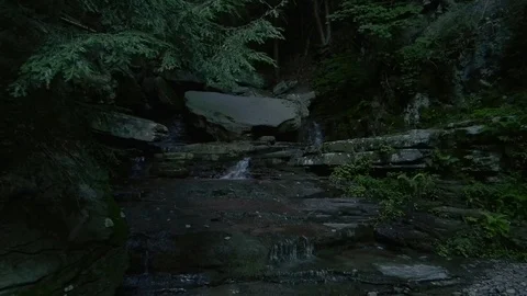 Small forest stream waterfall, slow zoom in Stock Footage 92647485