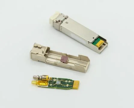 Small Form-factor Pluggable SFP nework module disassambled. Stockfoto's