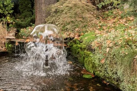 Small fountain in park Stock Photos