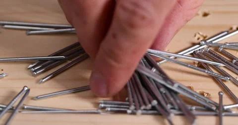 Small galvanized nails for decorative work, nails with small caps for finishing Stock Footage 279521202