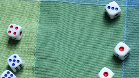 Small game dice being thrown on a table forming an abstract blank empty sli.. Vídeo Stock 237280906