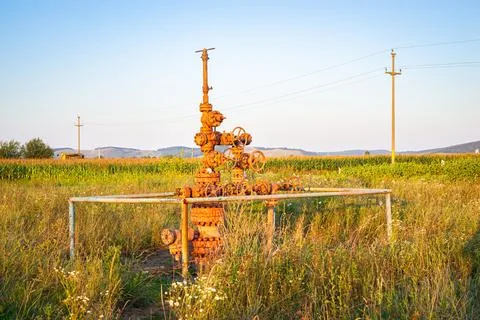 Small gas extraction facility in a field Stock Photos