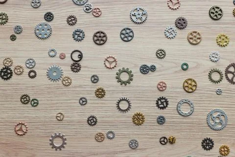 Small gears and cogs representing brain functioning on table 写真素材