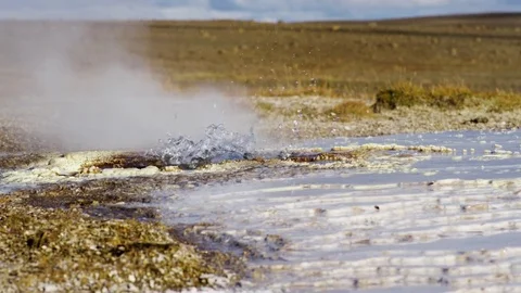 Small Geyser Eruption, Water Bubbles And Sprays, Steam Rises, In Iceland Video stock 82597332