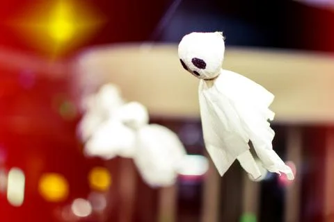A small ghost of paper hanging on a rope Stock Photos