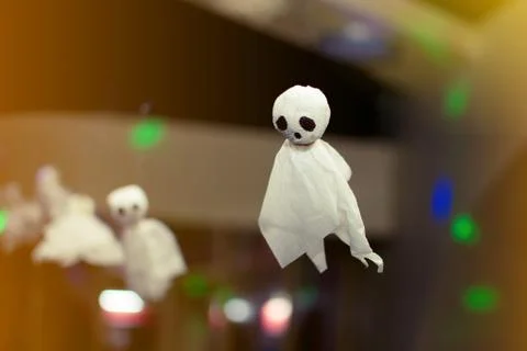 A small ghost of paper hanging on a rope Stock Photos