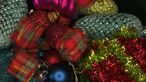 Small gift boxes falling in slow motion on  Christmas ornaments. Stock Footage 220049223