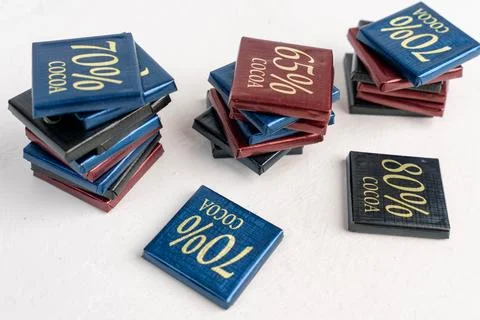 Small gift chocolate bars with different percentages of chocolate Stock Photos