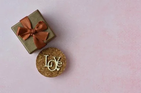 Small Gift on a pink background. Stock Photos