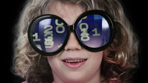 A small girl with glasses with code Stock Footage 321647977