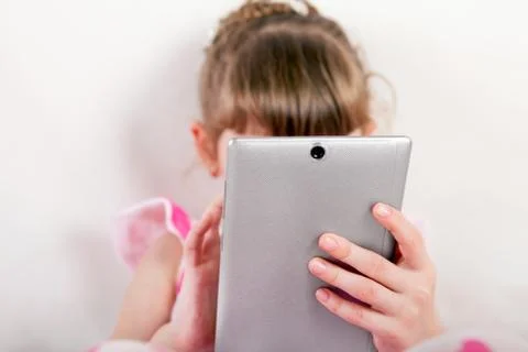 Small Girl with Tablet Computer Stock Photos