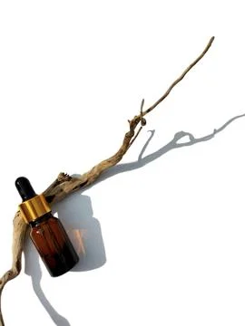 Small glass bottle with a dropper cap Foto stock