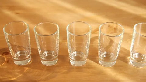 Small glasses and a cognac one Stock Footage 51104270