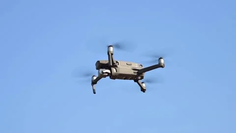 Small gray drone flying in the air Stock Footage 234721136