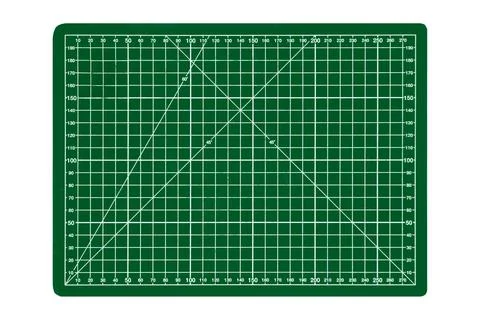 A small green cutting mat with a white grid is isolated. Stock Photos