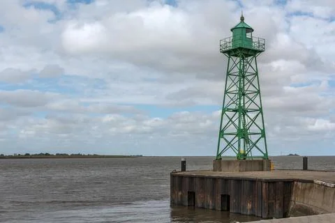 Small green lighthouse at the mouth of the Geeste River, Bremerhaven Stock Photos