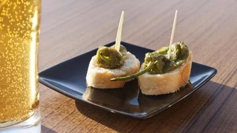 Small green peppers bites. Stock Photos