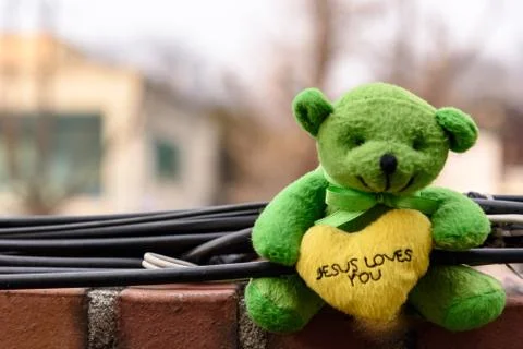 Small green teddy bear Stock Photos