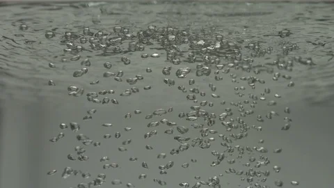 Small Grey Bubbles Rise to Surface Stock Footage 75912879
