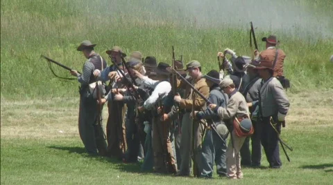 Small Group of Confederate Soldiers Loading and Firing at Will Video stock 879843