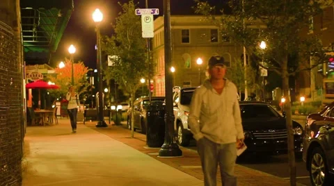 Small Group of Pedestrians on Downtown Sidewalk Stock Footage 1094232