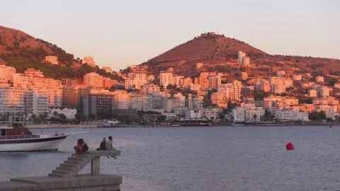 Small Group of People Enjoying the Sunset in Sarande, Albania Video stock 224718221