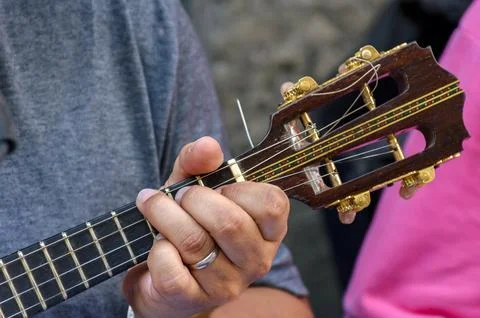 Small guitar with four strings called cavaquinho in Brazil and traditionally Stock Photos