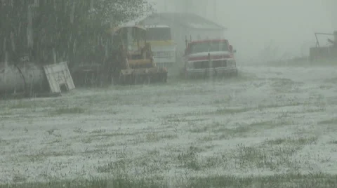 Small Hailstones Piling Up during Thunderstorm Stock Footage 54749946