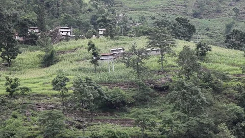 Small Hamlet Nestled on Himalayan Mountainside Stock-Footage 86758336