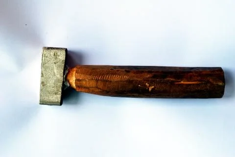 A small hammer made from a broken padlock, then cut in half and put the woode Stock-Fotos