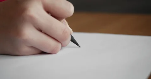Small hand drawing on blank paper with a pencil. Stock Footage 86507313
