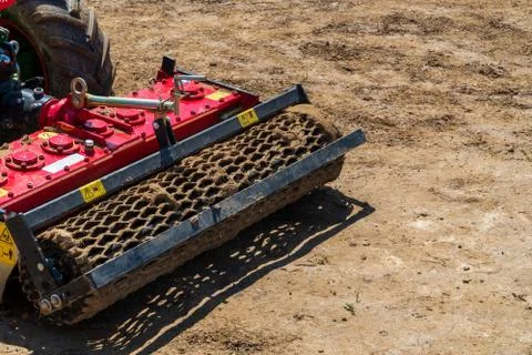 Small hand tractor in the spring for soil cultivation to prepare soil for gar Stock Photos