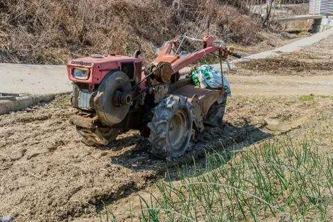Small hand walking tractor Stock Photos