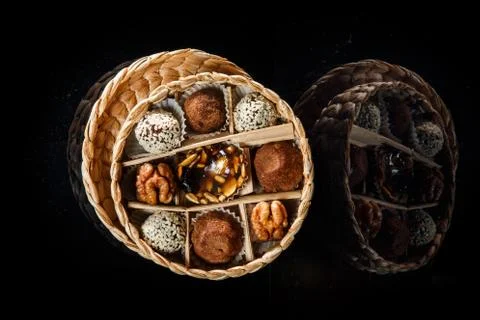 Small handmade box filled with assorted healthy useful handmade candies Fotos Stock