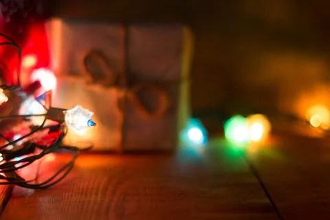Small Handmade gift boxes in shiny blue night . Stock Photos
