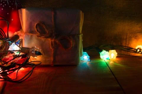 Small Handmade gift boxes in shiny blue night . Stock Photos