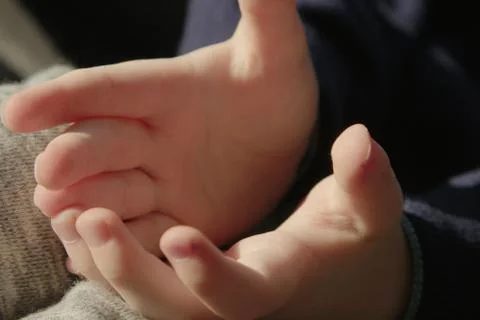 Small hands of child Stock Photos