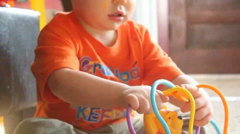 Small hands playing toys Video stock 22427218
