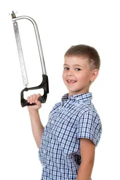 Small handsome builder in blue checkered shirt holding a saw, isolated on white Stock Photos