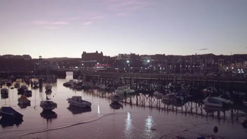 Small harbor in sleepy town in sunset Video stock 167952833