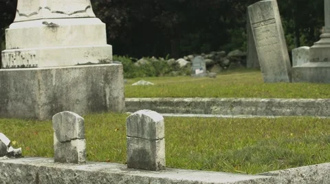 Small Headstones in Cemetery Stock Footage 40909431