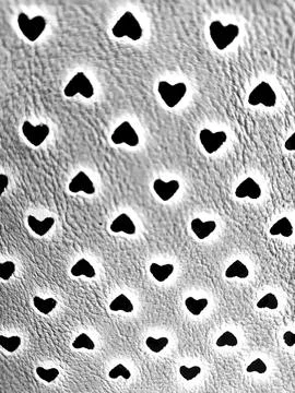 Small hearts black vertical effect image, with gray background conveying. Foto stock