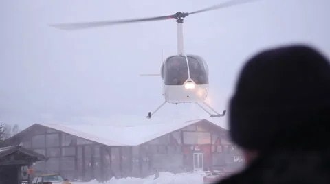 Small helicopter flying away Stock Footage 61419531