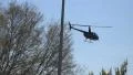 Small Helicopter Taking Off From Parking Lot 4k or 4k+ Resolution