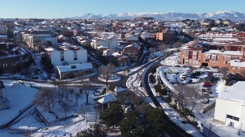 Small hermit covered in snow inside town. Stock Footage 158547805