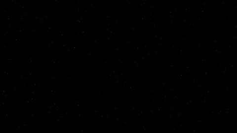 Small, high-density flashing particles shine against a black background. Vidéo 320886013