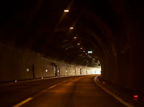 Small highway tunnel with lights Stock Photos