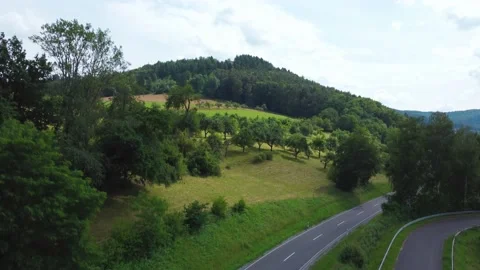 A small hill with a forest and an abandoned church at the top Stock Footage 161068136