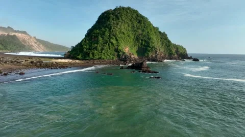 Small Hill Of Red Island Beach In Banyuwangi, East Java, Indonesia. Aerial Stock Footage 335390932