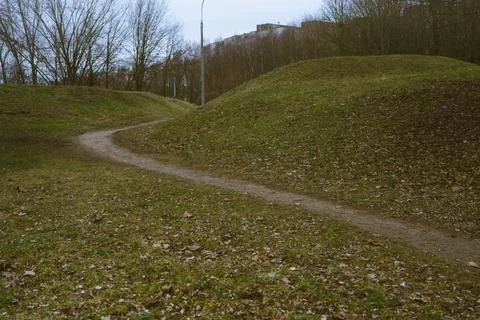 Small hills and a path between them Stock Photos